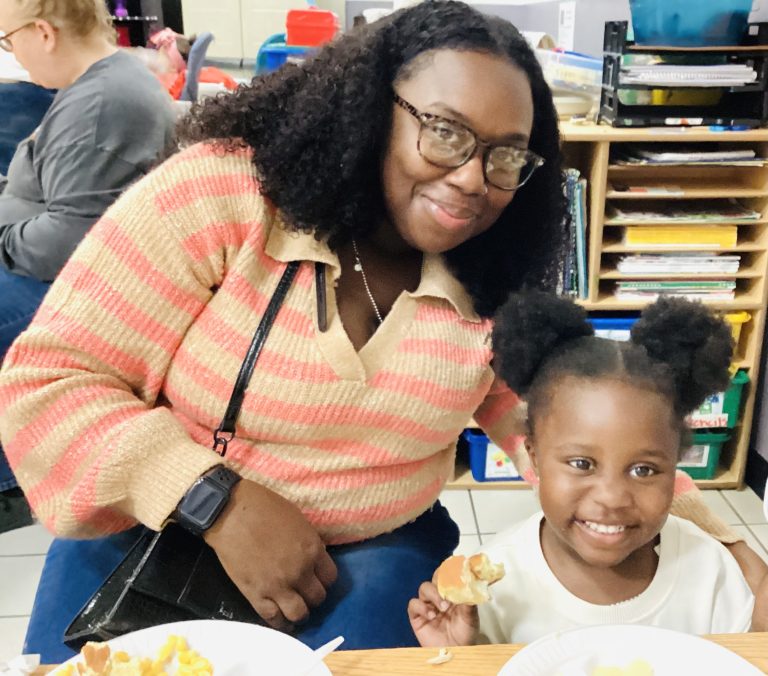 Mom and her daughter at Thanksgiving feast